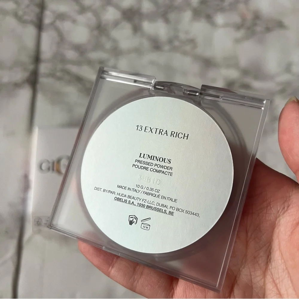 huda beauty glowish luminous pressed powder 13 extra rich June sale